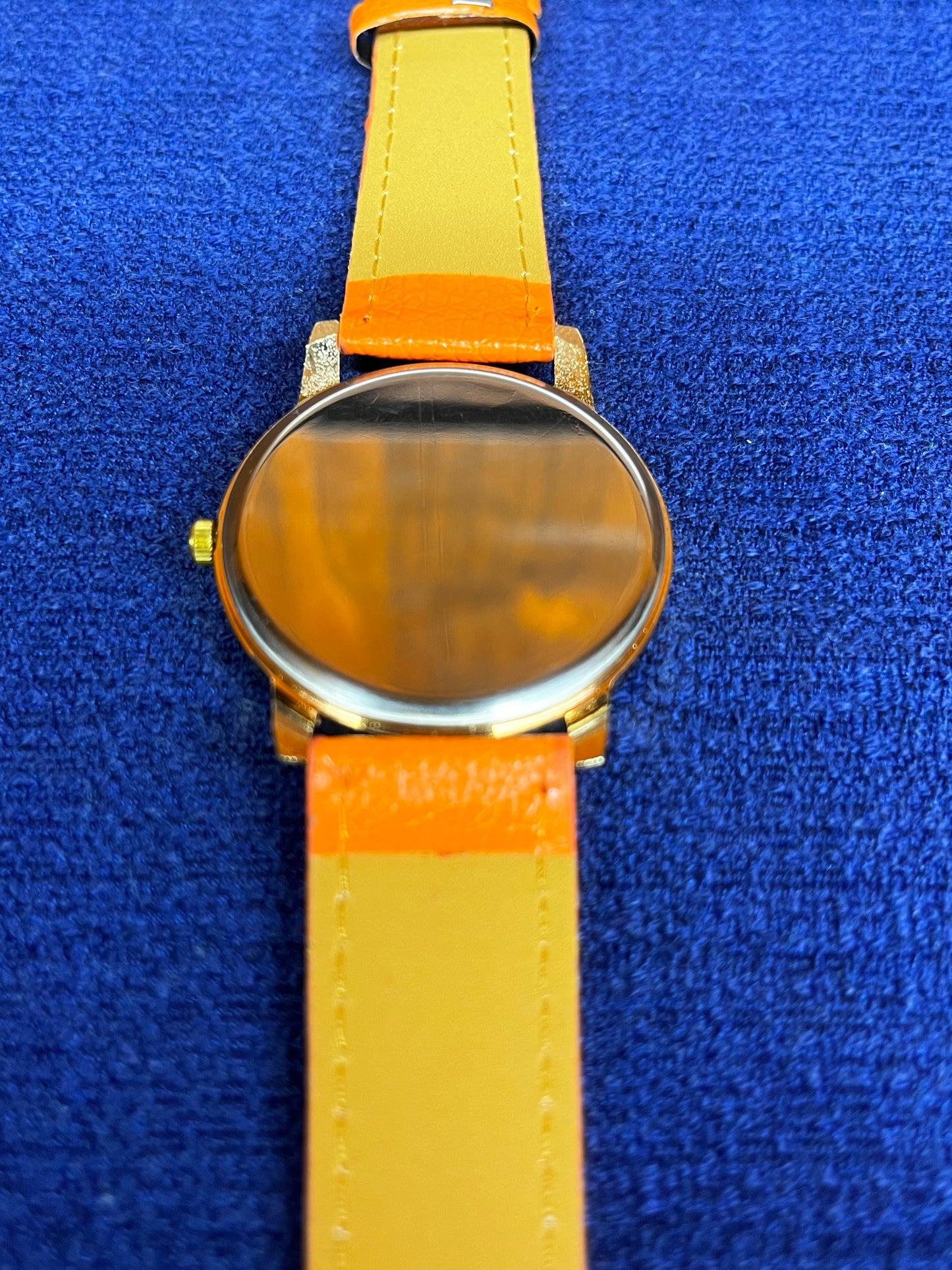 Geneva Women's Rhinestone Gold Plated Face Watch With Orange Wristband