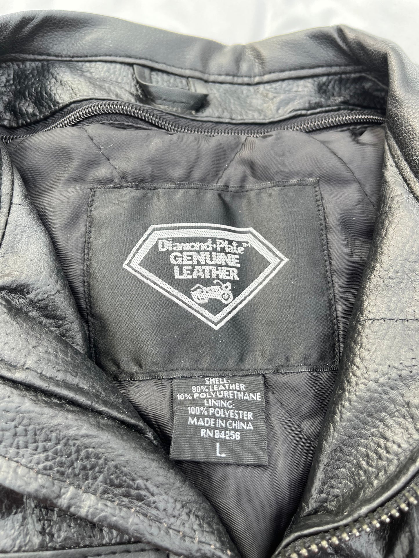 Diamond Plate Genuine Leather Black and Orange Motorcycle Jacket