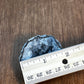 Gray Geode Filled With White Crystals