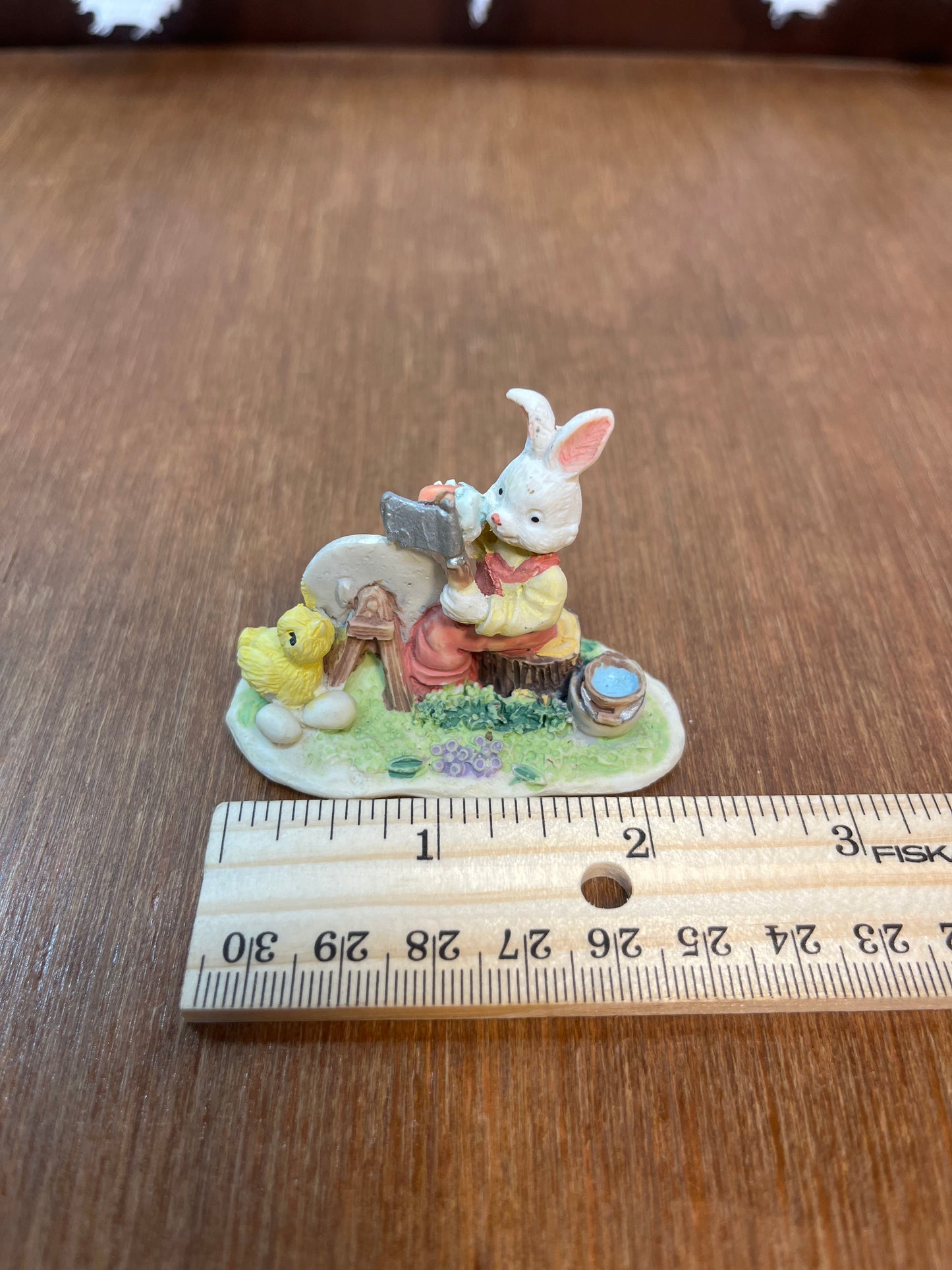 Village Bunny Axe Sharping Figurine