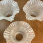 Three Frosted Ruffled Glass Shades